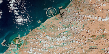 Archive Copernicus satellite image showing flooded areas south of Dubai in April 2024