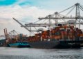 Commercial cargo vessel illustrating shipping costs near the Gulf of Oman