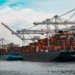 Commercial cargo vessel illustrating shipping costs near the Gulf of Oman