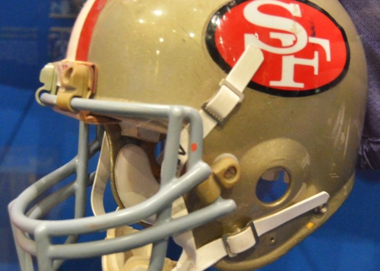 Authentic archival San Francisco 49ers gold football helmet on display, not from October 2026 game