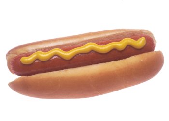 Illustrative hot dog with mustard, photographed by Renee Comet for the National Cancer Institute; not a recalled Kayem product