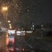 Archive photograph of rain on a Dubai road at night