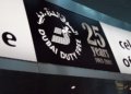 Archival advertising signage at Dubai International Airport, illustrating advertising content design