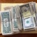 Illustrative photograph of bundles of United States dollar banknotes taken in 2020