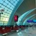 Passenger waiting area inside Dubai International Airport, illustrating UAE family visit visa travel